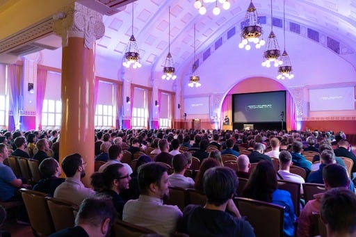 People at sponsor stands