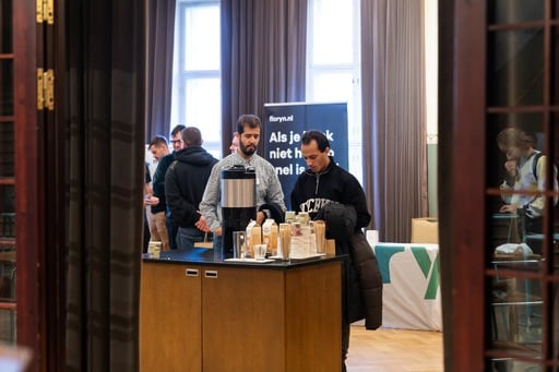 Two men getting coffee