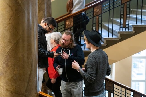 Antti Merilehto helps out some attendees