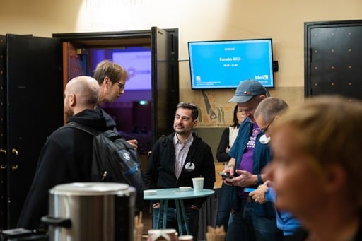 Attendees in the foyer
