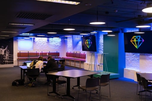 Two people work in the working space