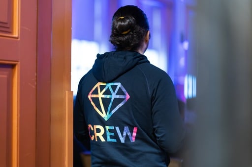 A member of the crew, Henri Nikka, watches a talk