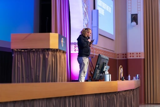 Antti Merilehto introduces the next talk