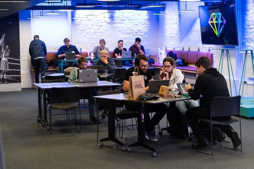 People working in the quiet working space