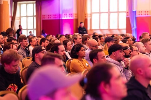 The audience watches