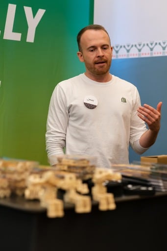 Shopify toys and a man in the background